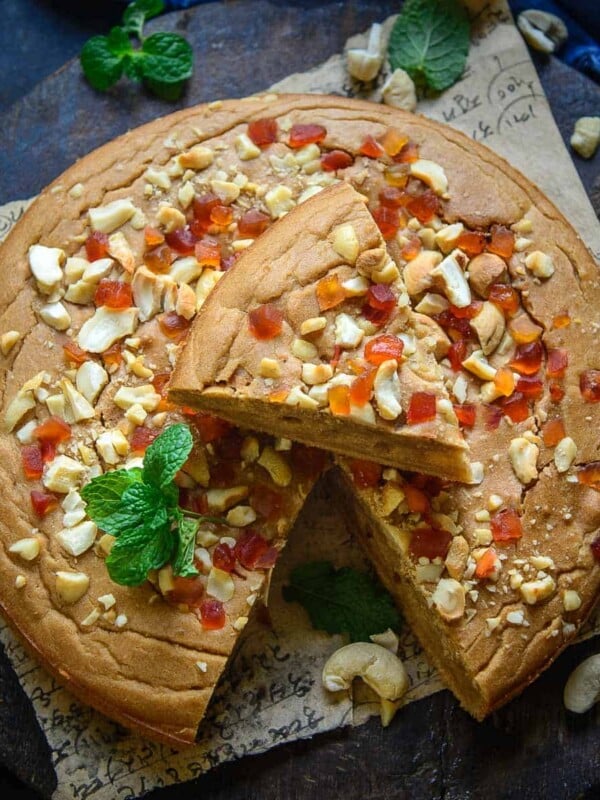 Marie Biscuit Cake is an incredibly easy eggless, flourless cake that just needs a few ingredients from your pantry. Make it for birthday parties, special occasions or just to serve as a dessert after your weekend meals. Here is how to make it.