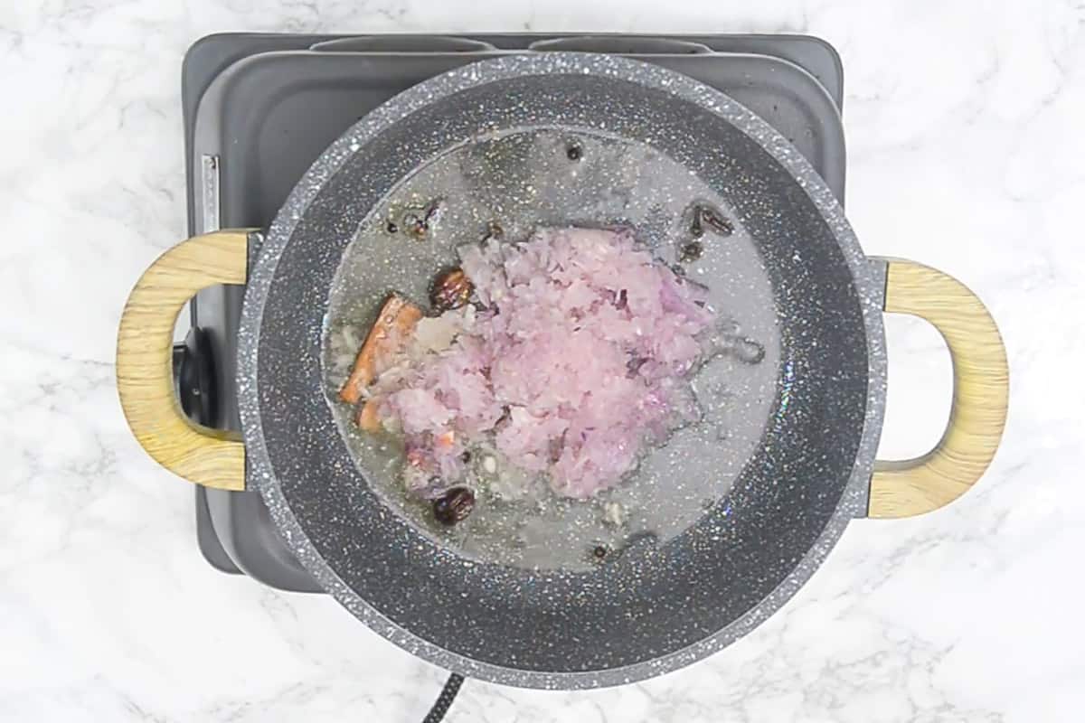 Grated onion added in the pan.