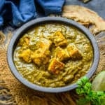 Creamy Saag Paneer is a delicious Indian curry made using a mix of green leafy vegetables and fried cubes of paneer. It is easy to make and goes well with Indian bread like Naan or Paratha. Here is how to make it.