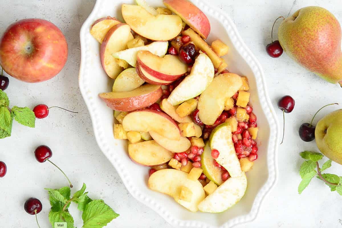 Fruits transferred to a baking tray.