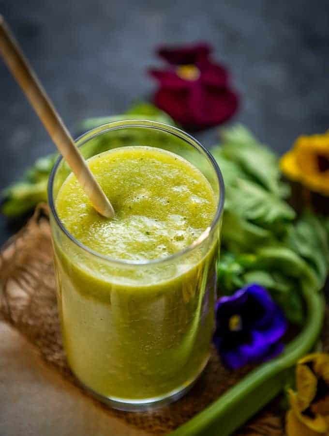 Celery smoothie served in a glass.