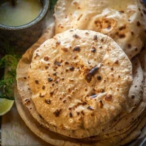 Roti, Chapati or Phulka is an Indian flatbread made using whole wheat flour. It;s a simple everyday bread in most Indian households. Here is how to make perfect soft roti recipe.