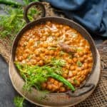 Kala Chana or Black Chana is a very good source of vegetarian protein. It can be cooked in a variety of forms like chaat, curries, or ghugni. Here is how to make Kala Chana Curry.