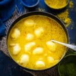 Kanji Vada is a traditional Rajasthani dish where lentil fritters are added in a mustard fermented water. It is a must make for the Holi festival. Here is how to make it.