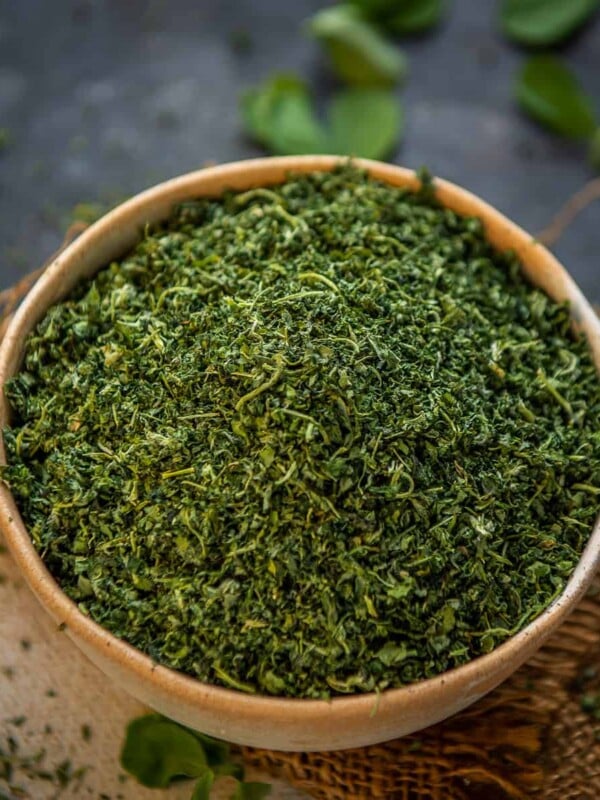 Dried Fenugreek Leaves or Kasuri Methi is an important herb in Indian cooking. Learn how to dry fenugreek leaves at home in this post.