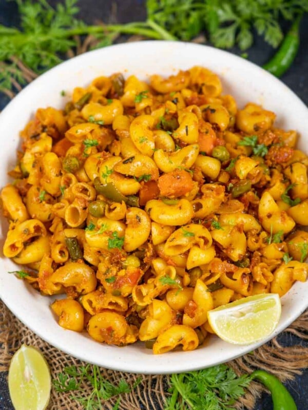 Indian Style Masala Macaroni Pasta is a pasta dish with a desi twist. This Indian-style pasta is spicy, loaded with cheese, and is perfect to serve for breakfast, lunch, or evening snacks (vegetarian).