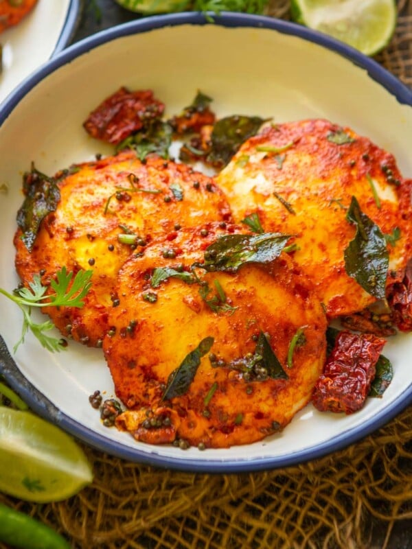 Egg Idli is a delicious snack or breakfast dish where eggs are steamed in an idli mold and then tossed in a spicy masala.