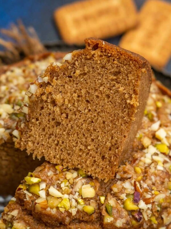 Parle G Biscuit Cake is an easy eggless cake made using Parle G biscuits. This recipe is a one-bowl recipe and is super easy to make. Do try.
