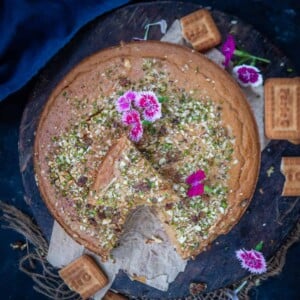Parle G Cake is an easy eggless cake made using Parle G Biscuits. This recipe is a one bowl recipe and is super easy to make. Do try.