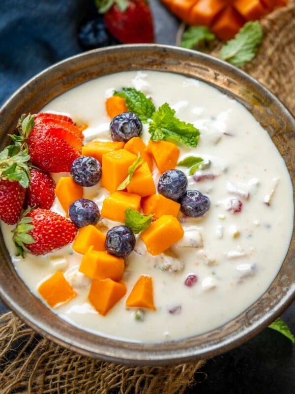 Fruit Cream is an Indian dessert with fresh fruits added to a creamy base. This fruit salad with cream is super easy to make and tastes very refreshing. Make it using my easy recipe (vegetarian, gluten-free).