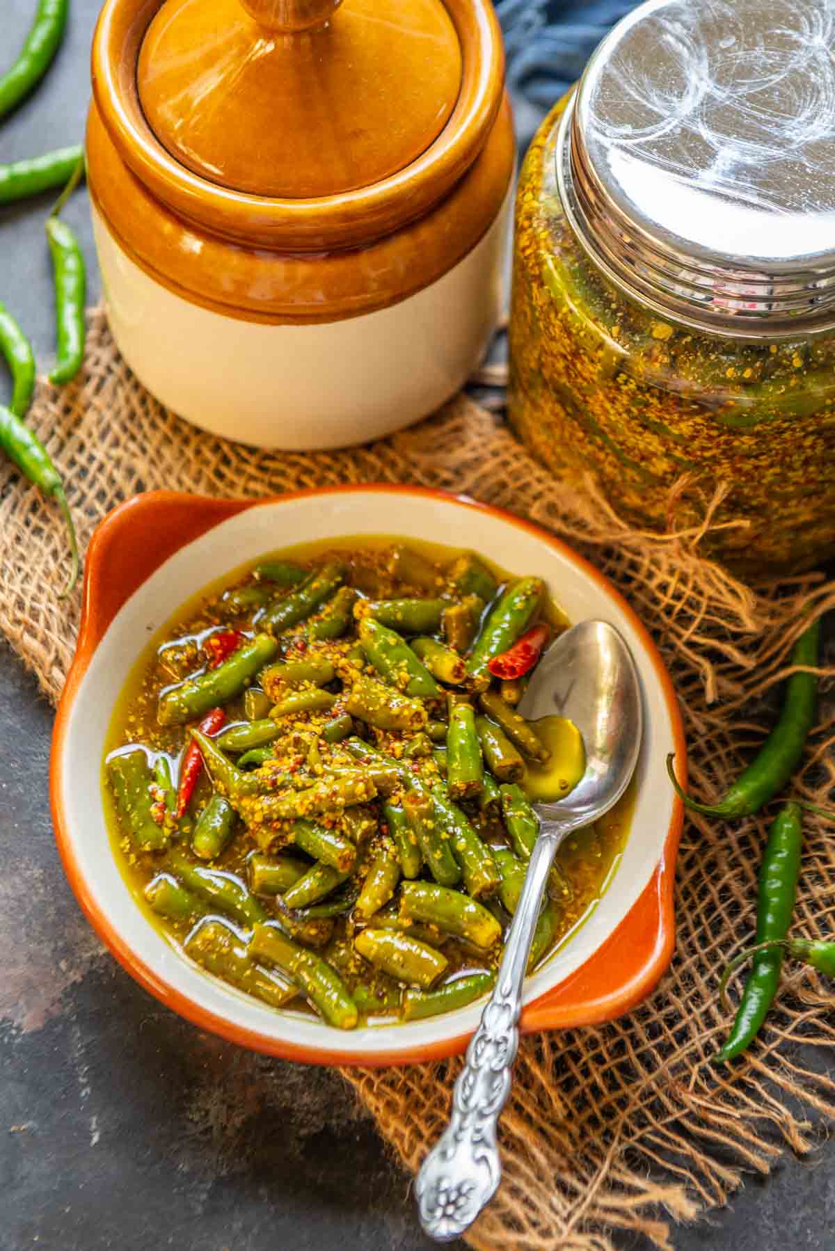 Green chilli pickle served in a bowl.