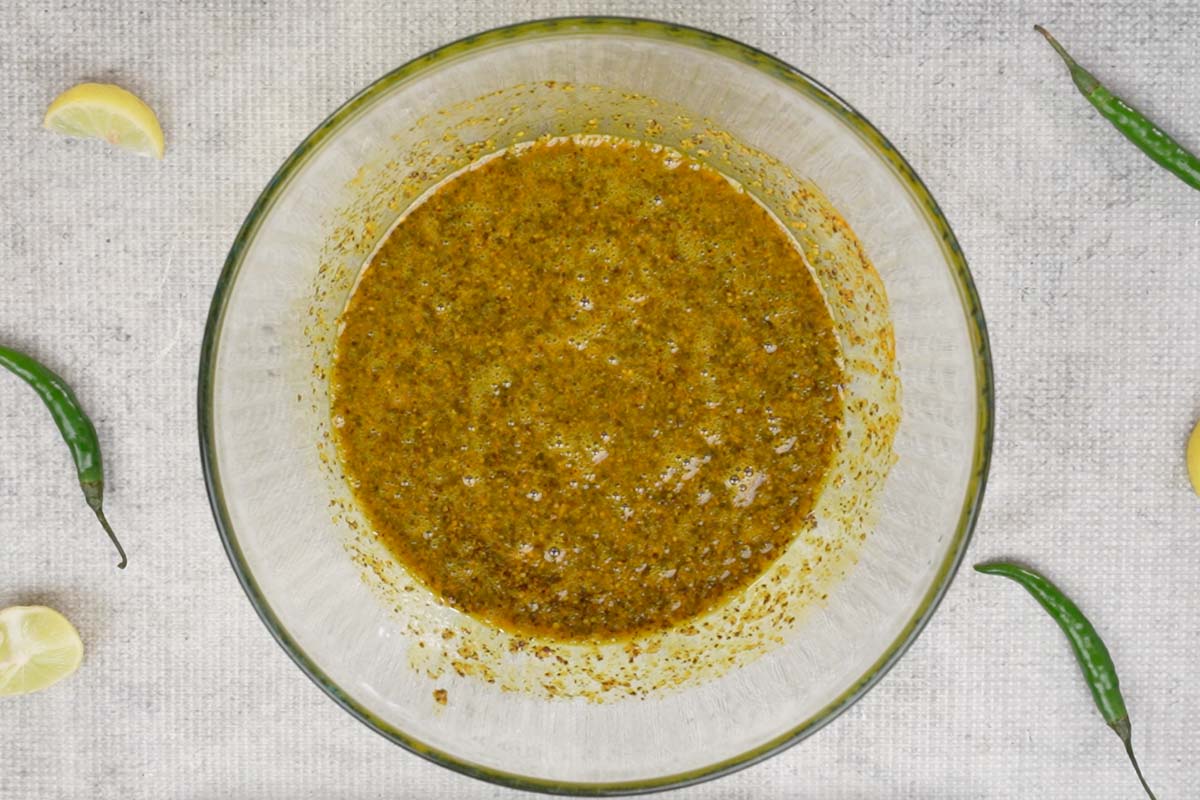 Some of the mustard oil mixed with the spices.