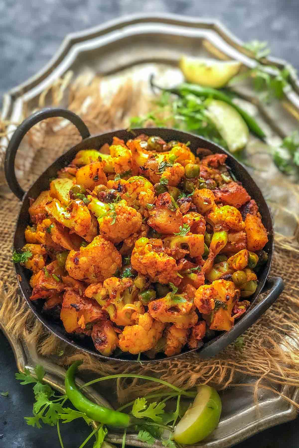 Aloo Gobi Matar served in a bowl.