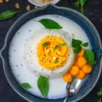 Mango sticky rice is a popular dessert in South East Asia and is made using sticky rice, coconut milk, and ripe mangoes. It's a popular vegan street-style dessert and can be made easily at home.