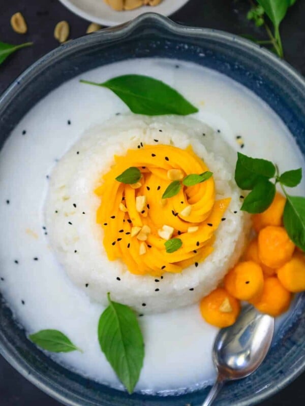 Mango sticky rice is a popular dessert in South East Asia and is made using sticky rice, coconut milk, and ripe mangoes. It's a popular vegan street-style dessert and can be made easily at home.