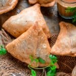 Make crispy and flaky Punjabi samosa at home using my simple recipe. Lots of tips and tricks to make the perfect samosa are included in the post.