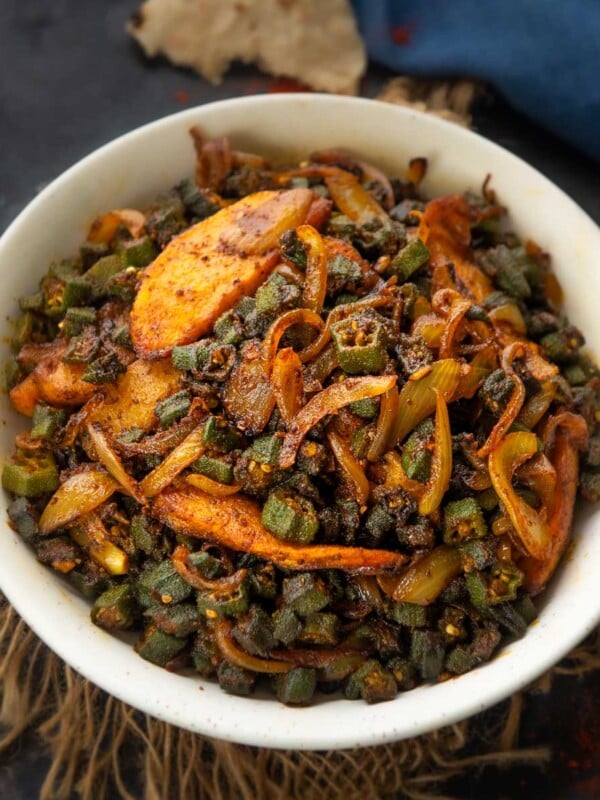 Aloo Bhindi (Potato Okra Stir Fry) is a simple Indian sabji made using potatoes, okra, and simple spices. Make it using my easy recipe (vegan, gluten-free).