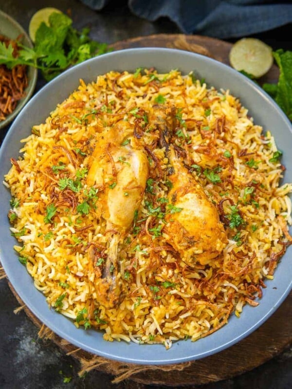 Try out my recipe to make Hyderabadi chicken biryani at home in the most traditional manner. The result is outstanding, I can promise.