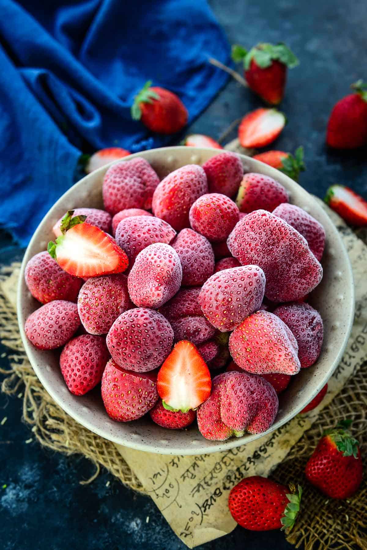 Frozen strawberries kept in a bowl.