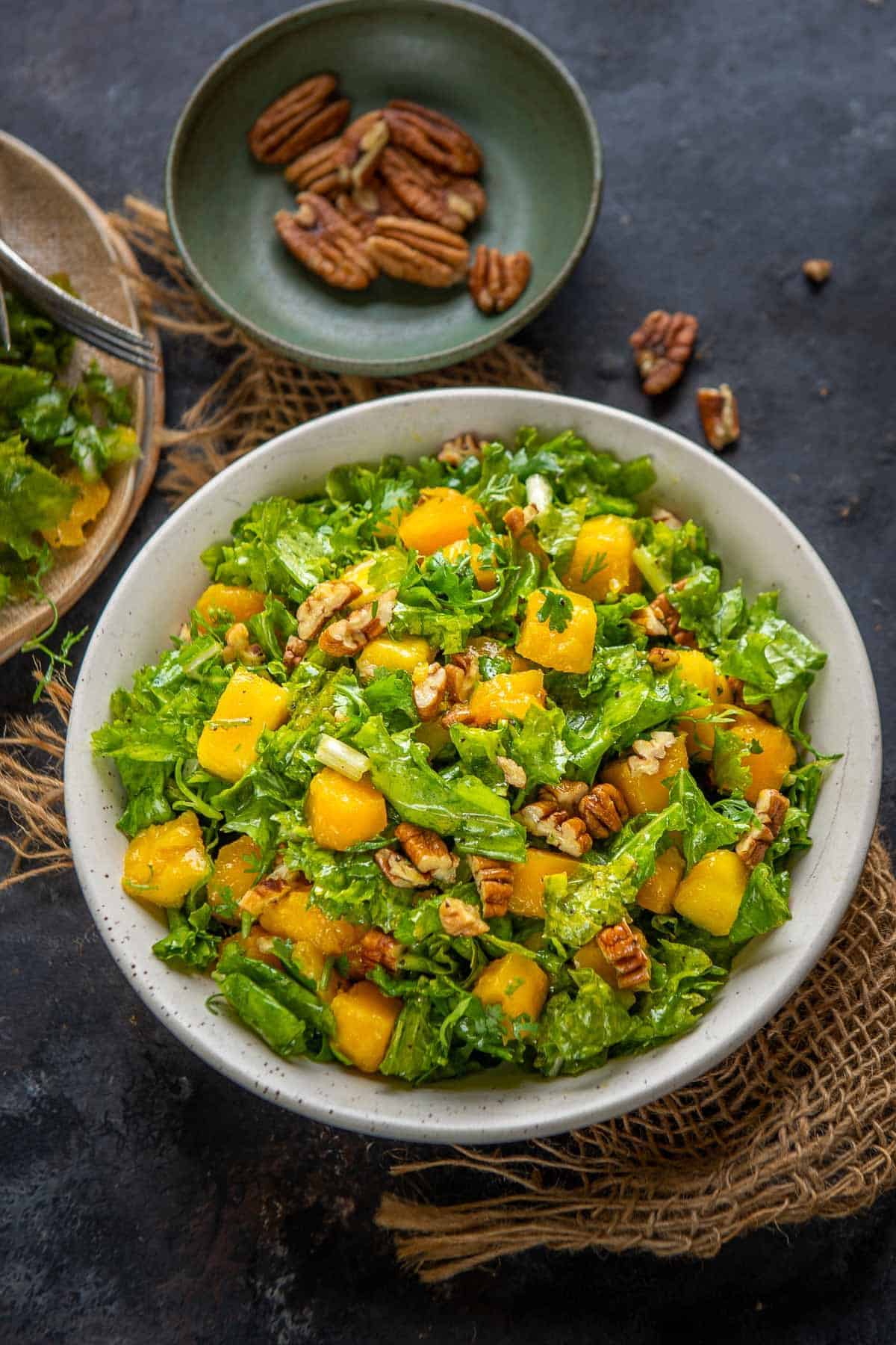 Kale mango salad served in a bowl.