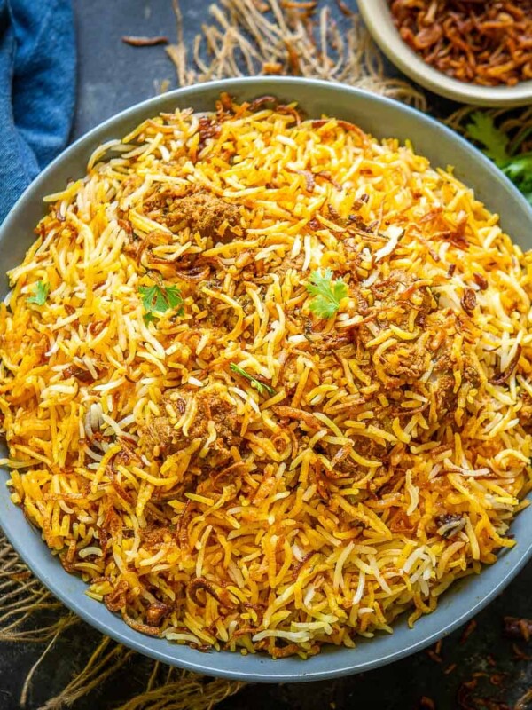 Make the best Hyderabadi Mutton Dum Biryani (Pakki Style) using my easy age-old recipe. Serve it with a salan (curry) or a raita for a hearty meal (gluten-free).