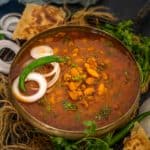 Punjabi Rajma Masala (Indian Red Kidney Bean Curry) is one of the most popular curries made in North India. Learn to make it at home using my easy recipe.