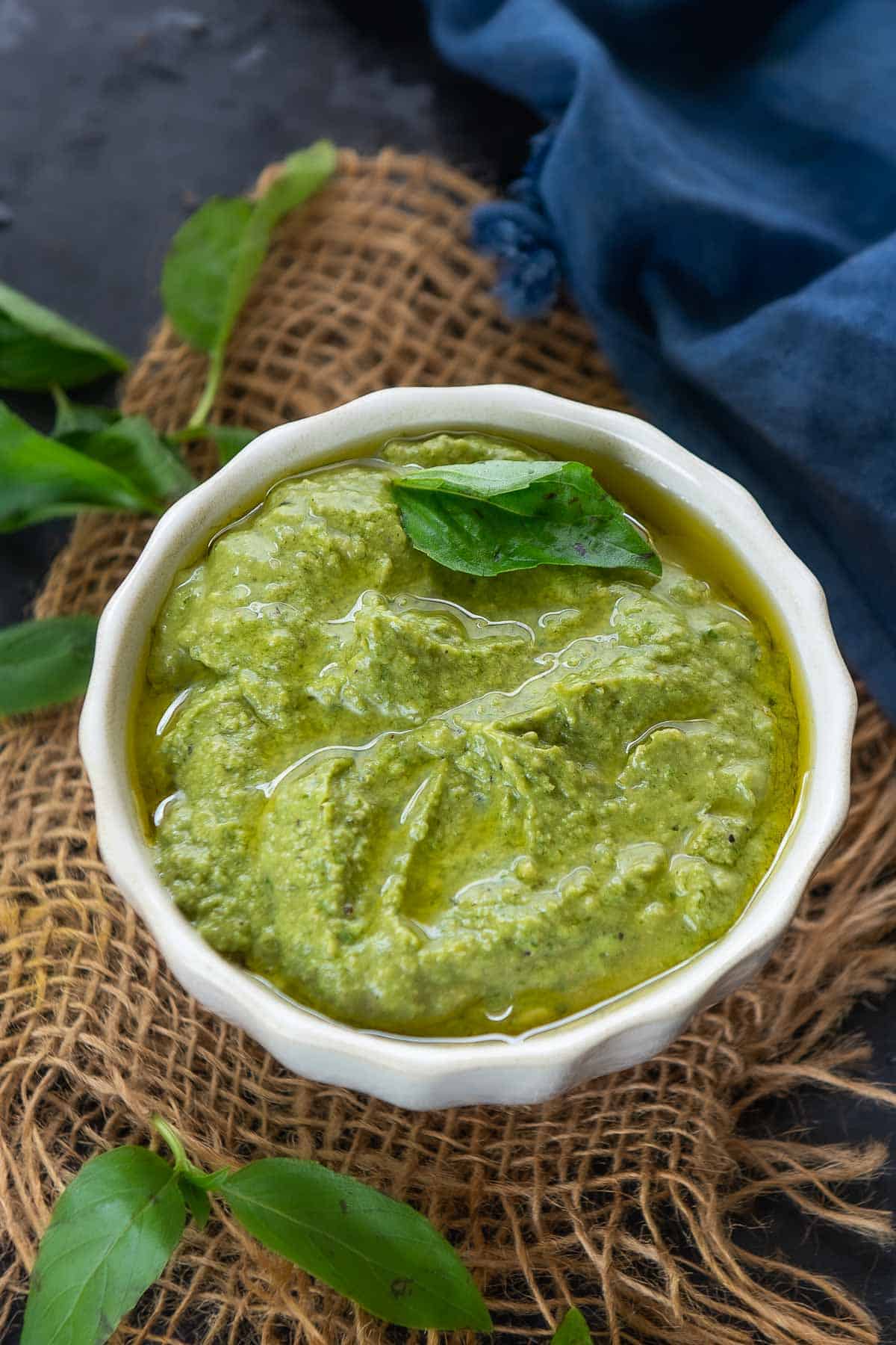 Avocado basil pesto served in a bowl.