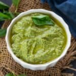 Avocado basil pesto served in a bowl.