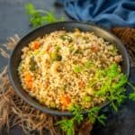 Quick and easy to make, Dalia Upma (Namkeen Dalia, Broken Wheat Upma, Godhi Upma, Godhum Upma) is a healthy breakfast option that can be made in a jiffy. Make it using my easy recipe (vegetarian).
