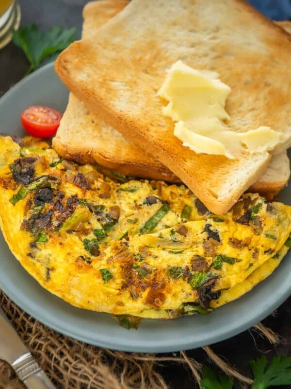 Spicy, crunchy and easy to make, Kimchi Omelette is a Korean breakfast staple. It is gluten free, dairy free and healthy with a umami kick.