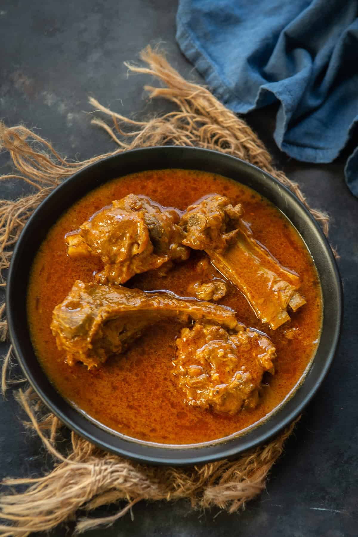 Mutton korma served in a bowl.