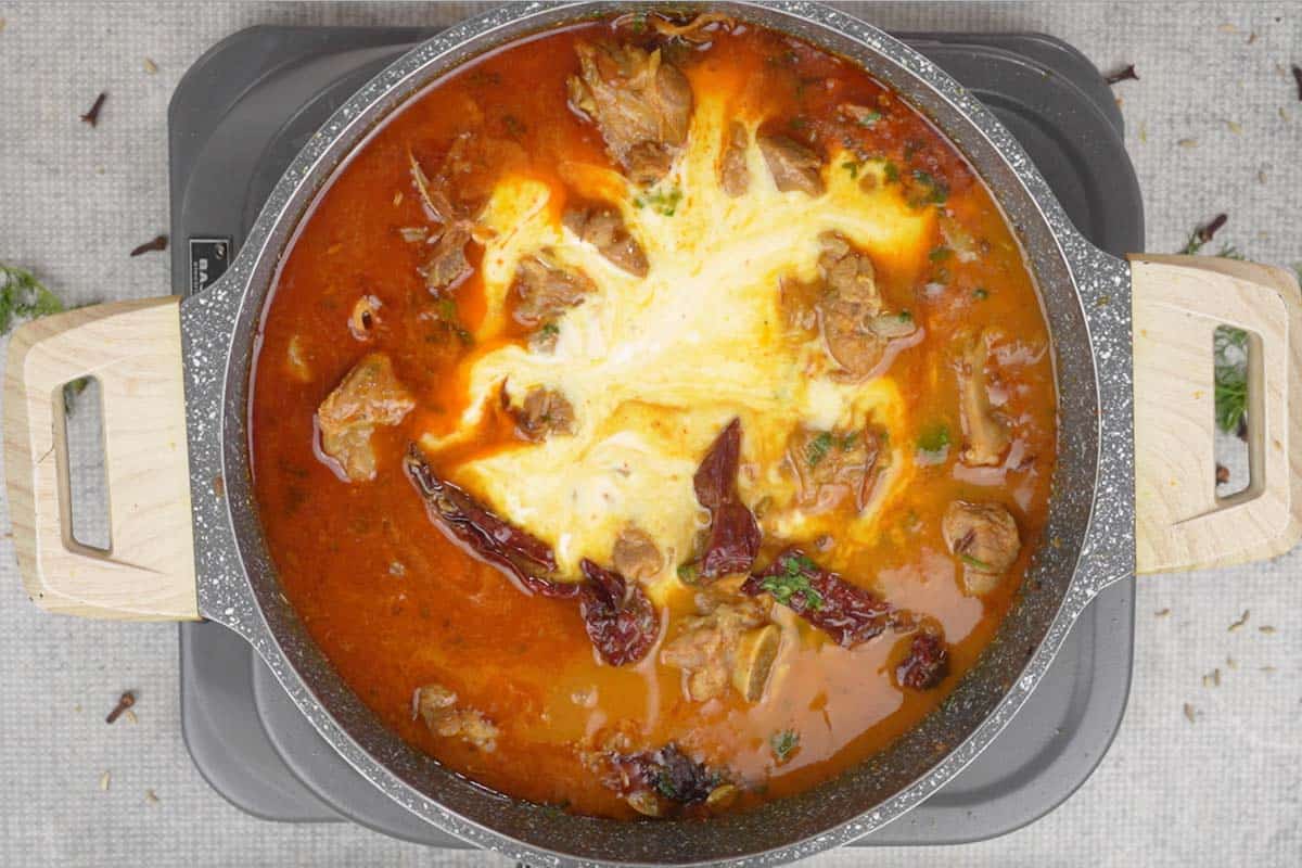 Coconut milk added to the pan.