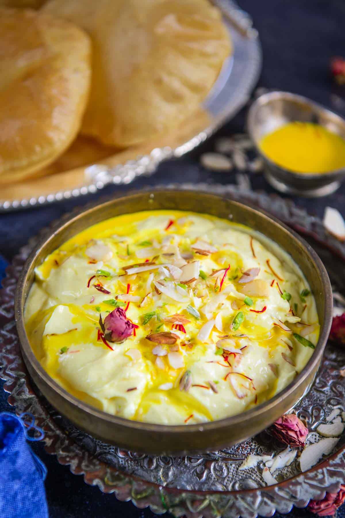 Kesar Elaichi Shrikhand served in a bowl.