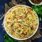 Hyderabadi Veg Biryani or Vegetable Biryani is a delicious medley of succulent vegetables, spices, ghee, saffron, and flavourful basmati rice which no one can resist. The best part is you can make a great restaurant-style version at home easily. Here is how to make it.