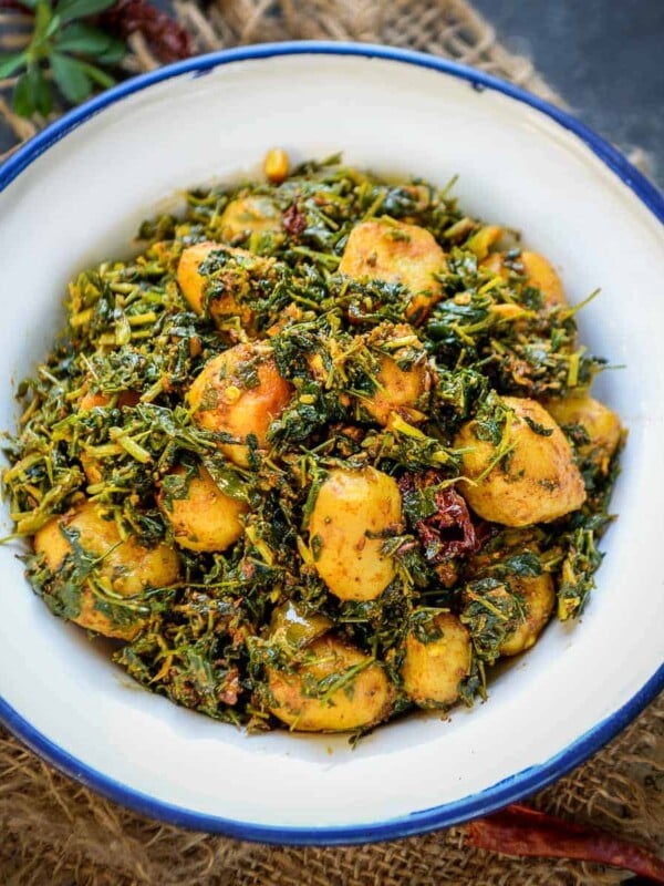 Made with the combination of potatoes, fresh fenugreek leaves, and everyday spices, Aloo Methi is a simple yet delicious stir fry that can be prepared for your everyday lunch box or a side dish with your Indian meals. Here is how to make it.