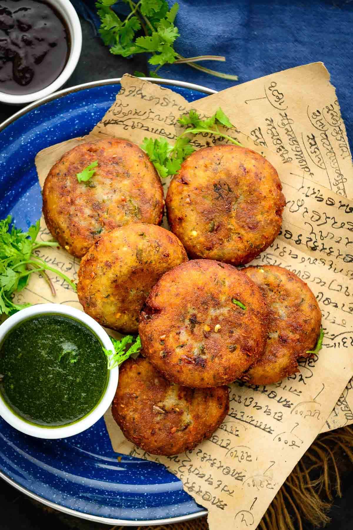 Aloo tikki served on a plate.