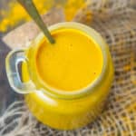 Golden Paste kept in a glass bottle.
