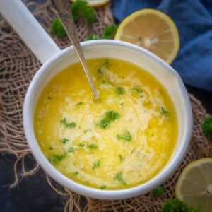 This 15 minute tangy Lemon Garlic Butter Sauce is super versatile. Use it over pasta, fish, vegetable, chicken, or meat, it's going to make you weak in your knees.
