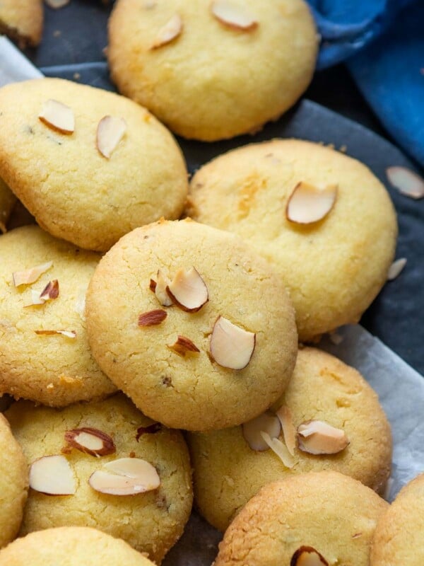 Nankhatai is a delicious crunchy Indian shortbread cookie made using ghee and flour. Make this yummy eggless bakery-style cookie at home using my simple recipe (vegetarian).