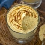 Creamy and fluffy, Pumpkin Fluff is a delicious dessert or dip loaded with fall flavors. Serve it on its own or as a dessert dip with cookies, crackers, pretzels, or apple slices for a yummy party appetizer this Thanksgiving.