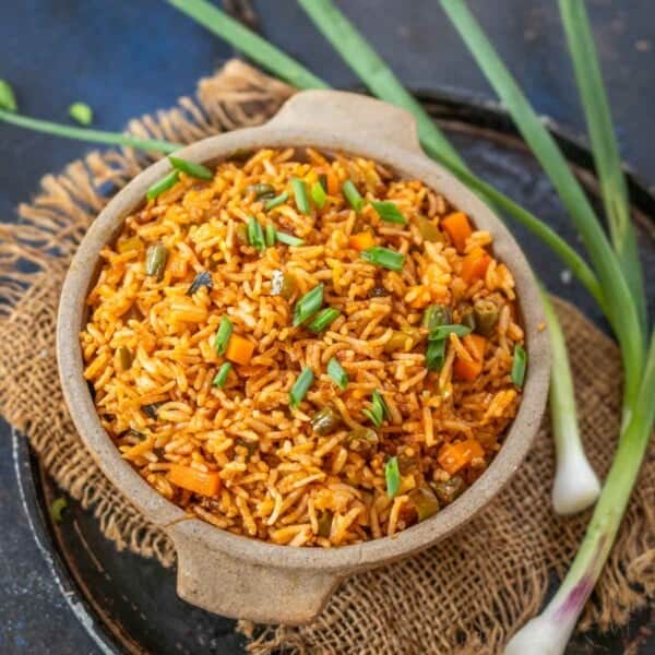 Schezwan Fried Rice (Szechuan Fried Rice) is an easy and delicious Indo-Chinese stir-fry dish in which cooked rice is tossed with spicy sauces and veggies. Here's how to make it.