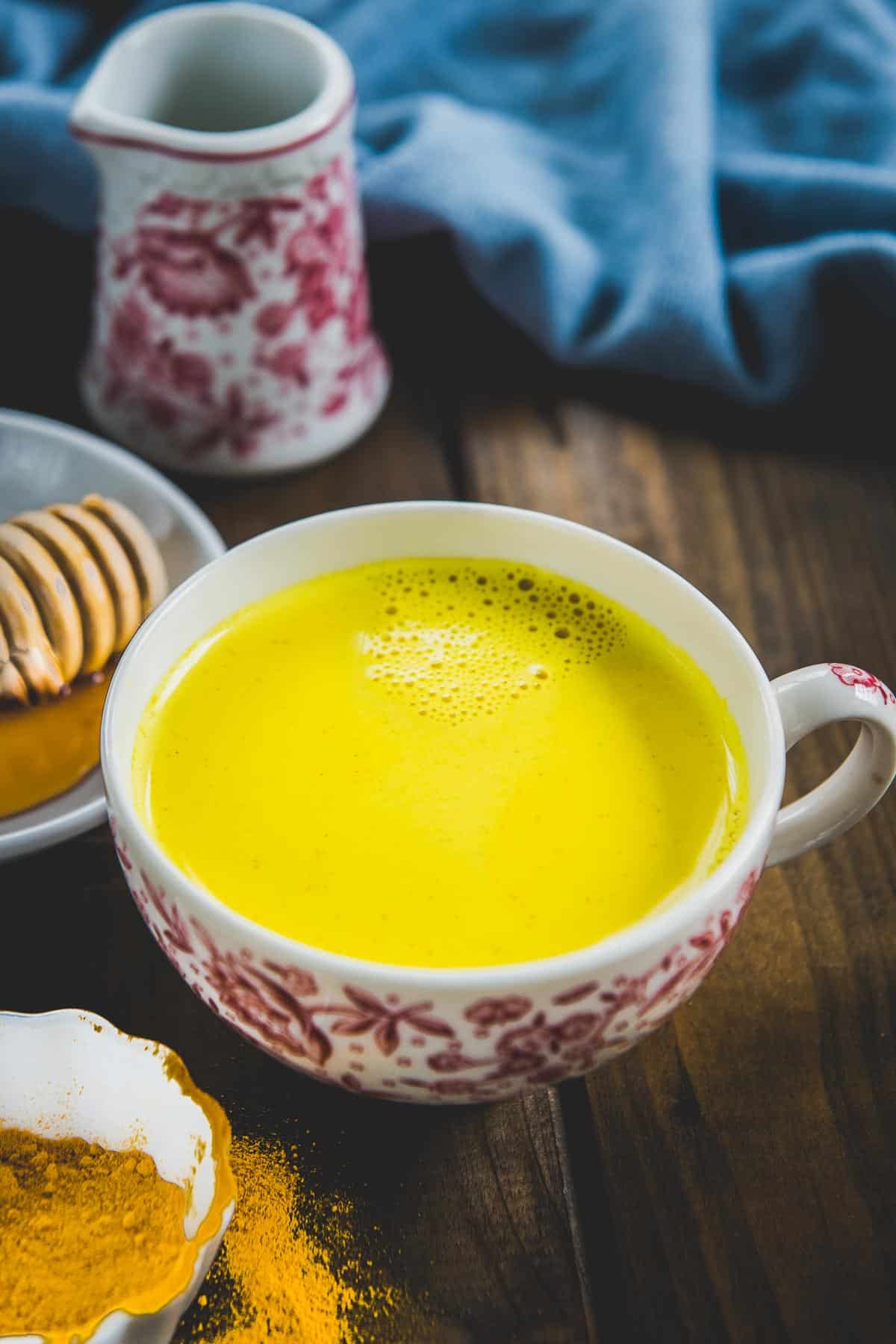 Haldi Doodh served in a cup.