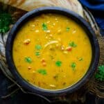 Bombay Chutney (Besan Chutney) is a curry-like dish made using chickpea flour and spices. It is a great side dish for poori, dosa, idli, chapati, or roti. Here is how to make it.
