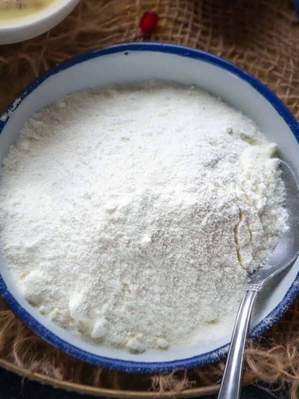 Made using just 5 ingredients in 5 minutes, this homemade eggless Custard Powder and milk are all you need to make a creamy custard. Make it at home from scratch using this quick and easy recipe (gluten-free).