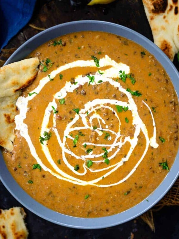 Rich, creamy, buttery, and smoky, Dal Makhani is a very popular North Indian lentil dish made using black lentils, lots of butter, and mild spices. Serve it with naan or jeera rice for an unforgettable meal!