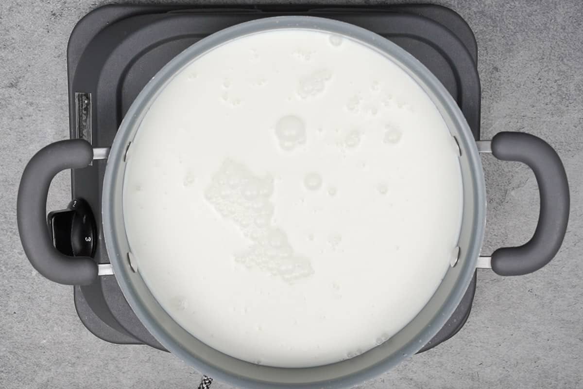 Milk heating in a pan.