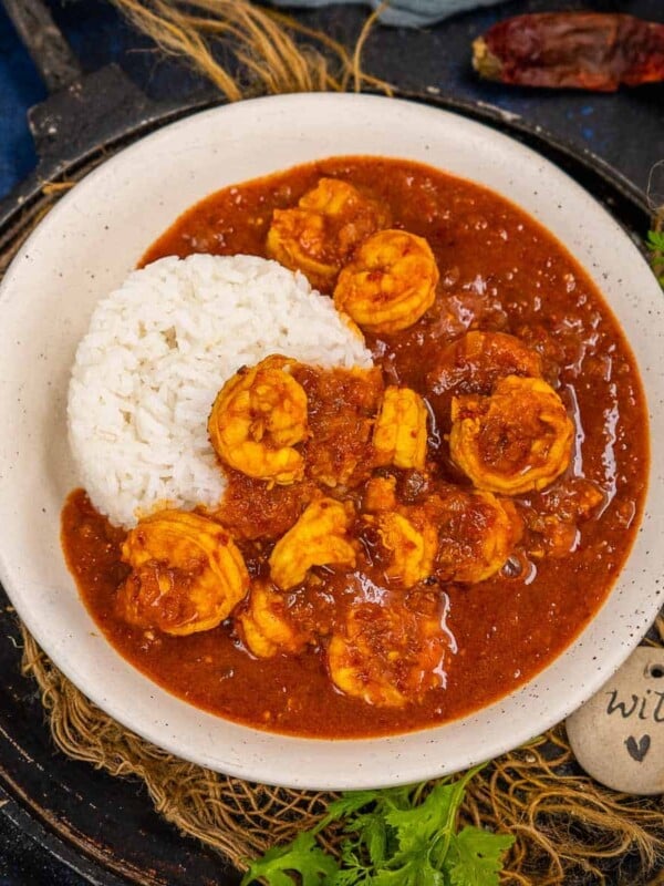 Shrimp Vindaloo (Prawn Vindaloo) is a Goan style curry made using fresh shrimp simmered in a sweet, spicy and tangy curry. Serve it with steamed rice or naan, this one won't disappoint you. Here is how to make it.