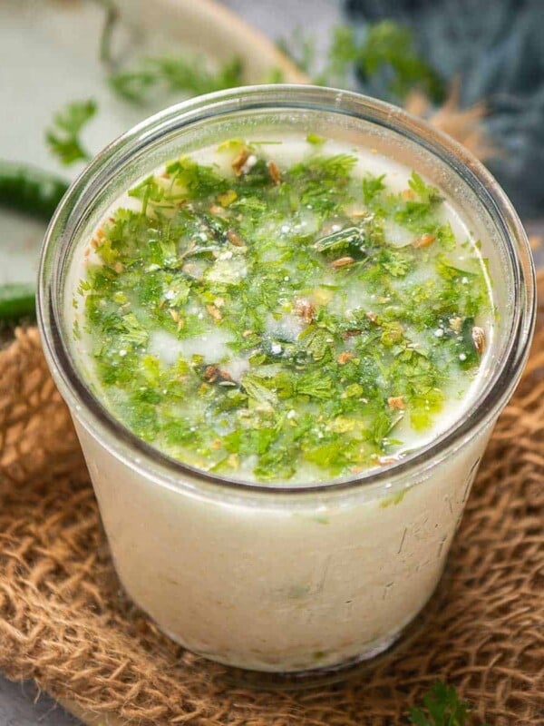 Taak, also called Mattha, is the Maharashtrian version of buttermilk made using yogurt (curd), herbs, and spices. Use my easy recipe to make this refreshing Indian summer drink.