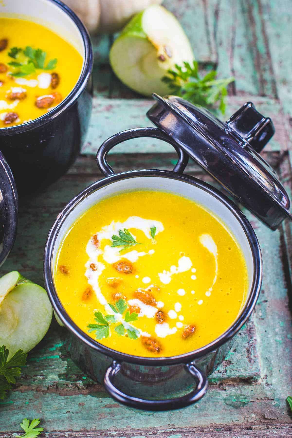 Pumpkin Apple Soup served in a bowl.