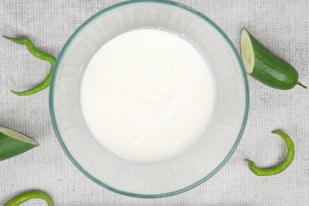Yogurt whisked in a bowl.